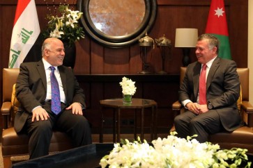 الملك الارني ورئيس الوزراء العراقي حيدر العبادي
