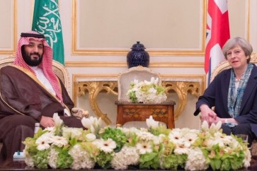 رئيسة الوزراء البريطانية، تيريزا ماي وولي العهد السعودي، محمد بن سلمان