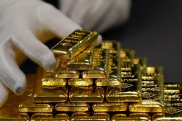 الذهب يرتفع مع تراجع الدولار مقابل اليوان