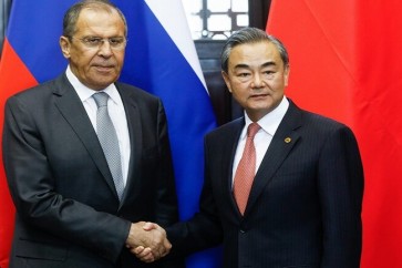 وزير الخارجية الروسي سيرغي لافروف ونظيره الصيني فان يي