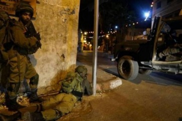 اشتباكات مسلحة بين المقاومين الفلسطينيين وقوات العدو الصهيوني اثناء محاولة التوغل في احد احياء جنين